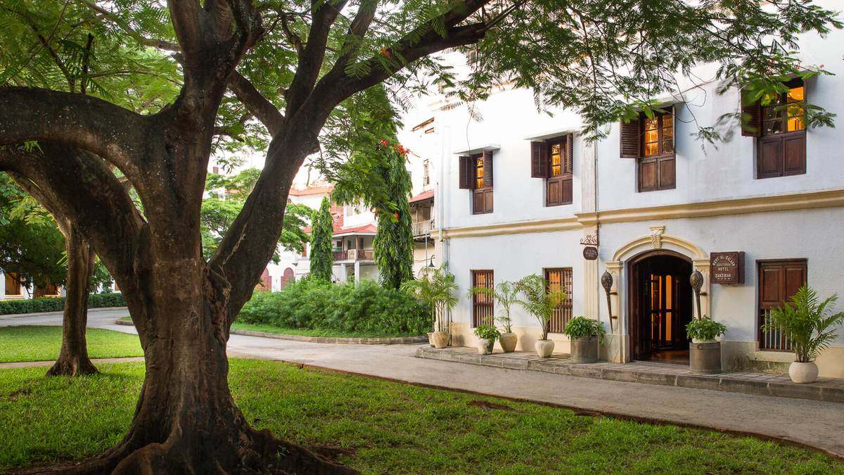 The restored historic facade of Beyt al Salaam on Kelele Square at golden hour
